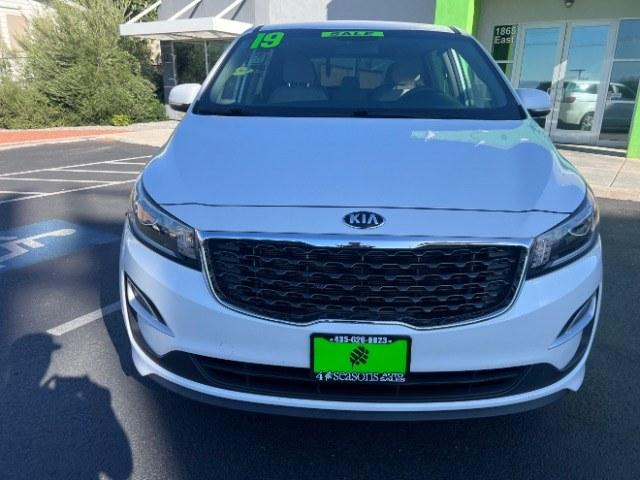 2019 Snow White Pearl /Gray Kia Sedona LX (KNDMB5C17K6) with an Lambda 3.3L V-6 gasoline direct injection engine, Automatic transmission, located at 1865 East Red Hills Pkwy, St. George, 84770, (435) 628-0023, 37.120850, -113.543640 - We specialize in helping ALL people get the best financing available. No matter your credit score, good, bad or none we can get you an amazing rate. Had a bankruptcy, divorce, or repossessions? We give you the green light to get your credit back on the road. Low down and affordable payments that fit- Photo#1