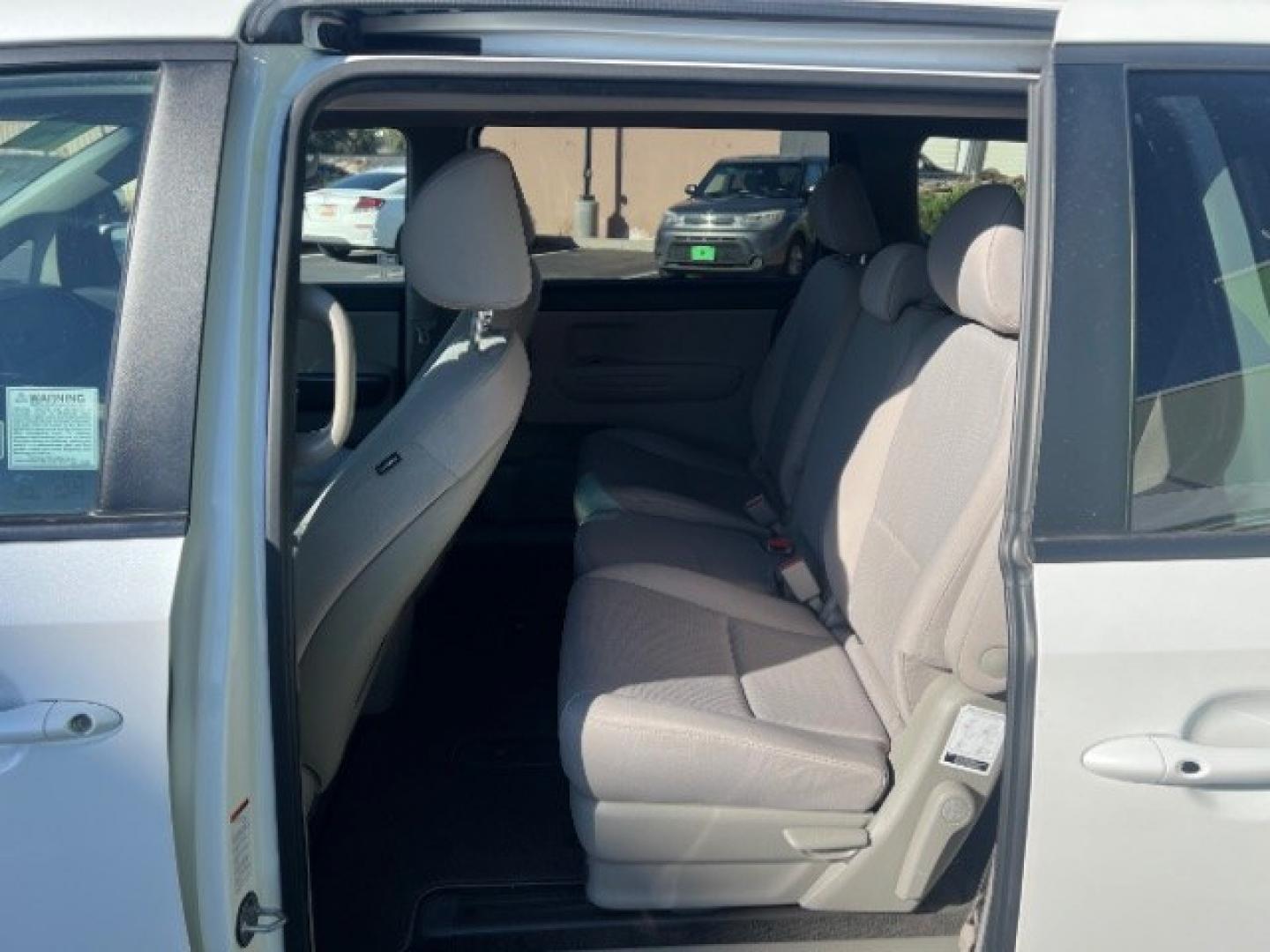 2019 Snow White Pearl /Gray Kia Sedona LX (KNDMB5C17K6) with an Lambda 3.3L V-6 gasoline direct injection engine, Automatic transmission, located at 940 North Main Street, Cedar City, UT, 84720, (435) 628-0023, 37.692936, -113.061897 - Versatile Southern Utah travel starts with this 2019 Kia Sedona LX. Its 3.3L V6 engine, automatic transmission, and front-wheel drive make it a smart fit for family trips, school runs, commuting, and road trips. With 88667 miles, this Sedona is ready for its next adventure. The LX adds three-row se- Photo#20