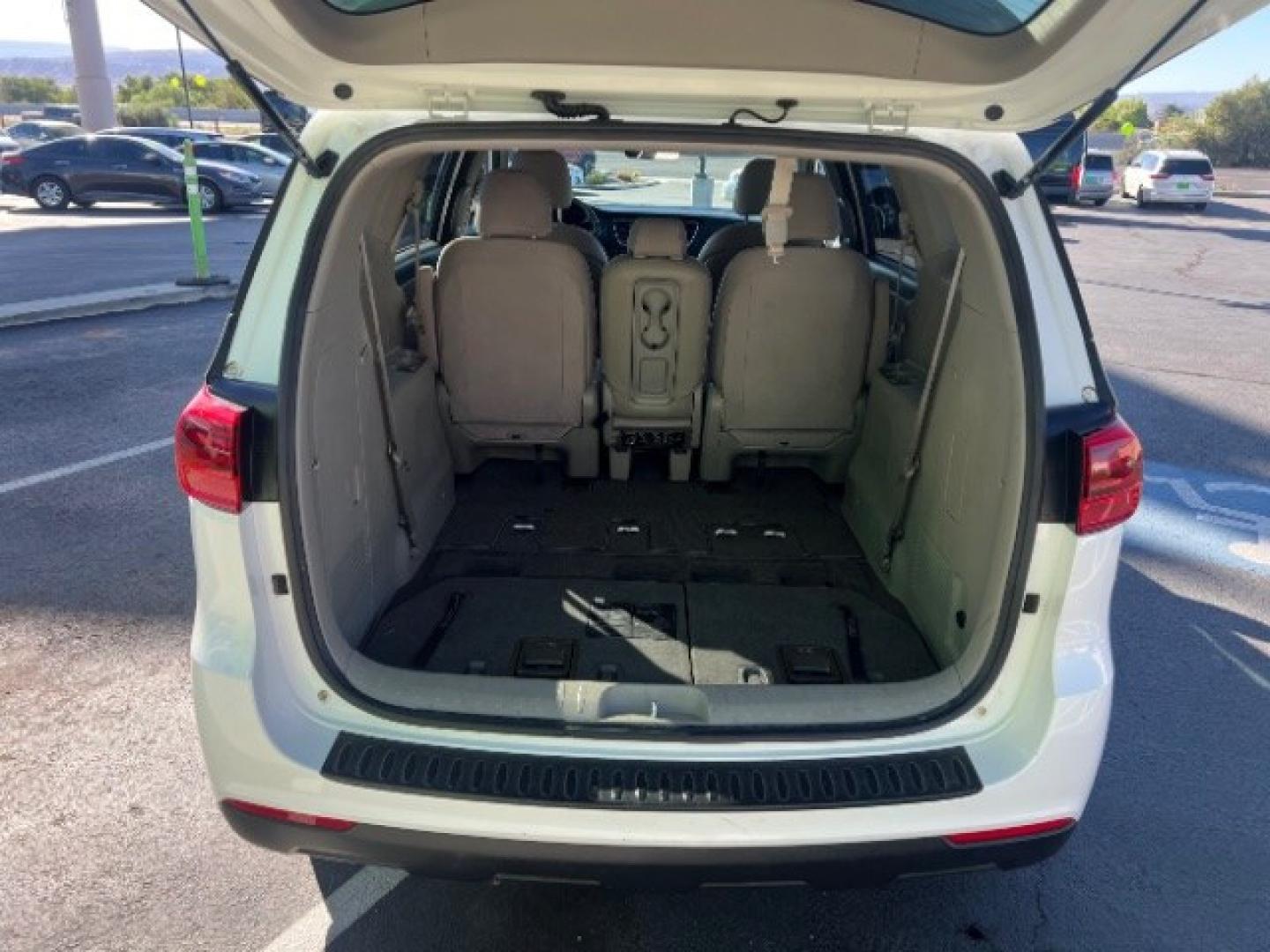 2019 Snow White Pearl /Gray Kia Sedona LX (KNDMB5C17K6) with an Lambda 3.3L V-6 gasoline direct injection engine, Automatic transmission, located at 940 North Main Street, Cedar City, UT, 84720, (435) 628-0023, 37.692936, -113.061897 - Versatile Southern Utah travel starts with this 2019 Kia Sedona LX. Its 3.3L V6 engine, automatic transmission, and front-wheel drive make it a smart fit for family trips, school runs, commuting, and road trips. With 88667 miles, this Sedona is ready for its next adventure. The LX adds three-row se- Photo#22