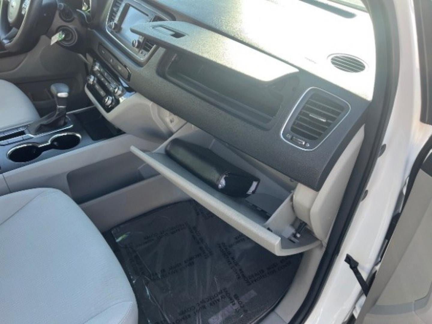 2019 Snow White Pearl /Gray Kia Sedona LX (KNDMB5C17K6) with an Lambda 3.3L V-6 gasoline direct injection engine, Automatic transmission, located at 940 North Main Street, Cedar City, UT, 84720, (435) 628-0023, 37.692936, -113.061897 - Versatile Southern Utah travel starts with this 2019 Kia Sedona LX. Its 3.3L V6 engine, automatic transmission, and front-wheel drive make it a smart fit for family trips, school runs, commuting, and road trips. With 88667 miles, this Sedona is ready for its next adventure. The LX adds three-row se- Photo#26