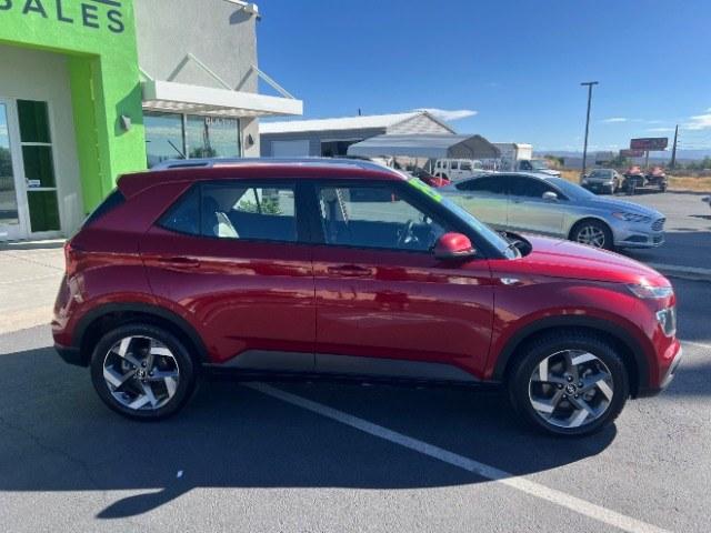 2025 Ultimate Red /Gray Hyundai Venue SEL (KMHRC8A39SU) with an Smartstream 1.6L I-4 DOHC engine, Automatic transmission, located at 940 North Main Street, Cedar City, UT, 84720, (435) 628-0023, 37.692936, -113.061897 - Versatile Southern Utah travel starts with this 2025 Hyundai Venue SEL. Its Smartstream 1.6L 4-cylinder, automatic transmission, and front-wheel drive make it a smart fit for commuting, errands, and easy Southern Utah day trips. With 49,995 miles, this Venue is ready for its next adventure. The SEL- Photo#7