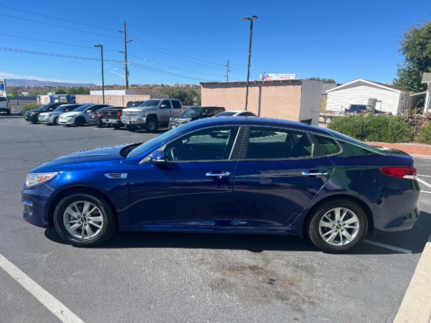 2017 Horizon Blue /Black Kia Optima LX (5XXGT4L36HG) with an Theta II 2.4L I-4 direct injection engine, Automatic transmission, located at 1865 East Red Hills Pkwy, St. George, 84770, (435) 628-0023, 37.120850, -113.543640 - Want a comfortable sedan that won't punish you at the pump? This 2017 Kia Optima LX brings Kia's 2.4L four-cylinder and front-wheel drive - a smooth daily driver for Southern Utah commuting and weekend trips. We specialize in in-house financing and work with all credit types - good, fair, challenge- Photo#3