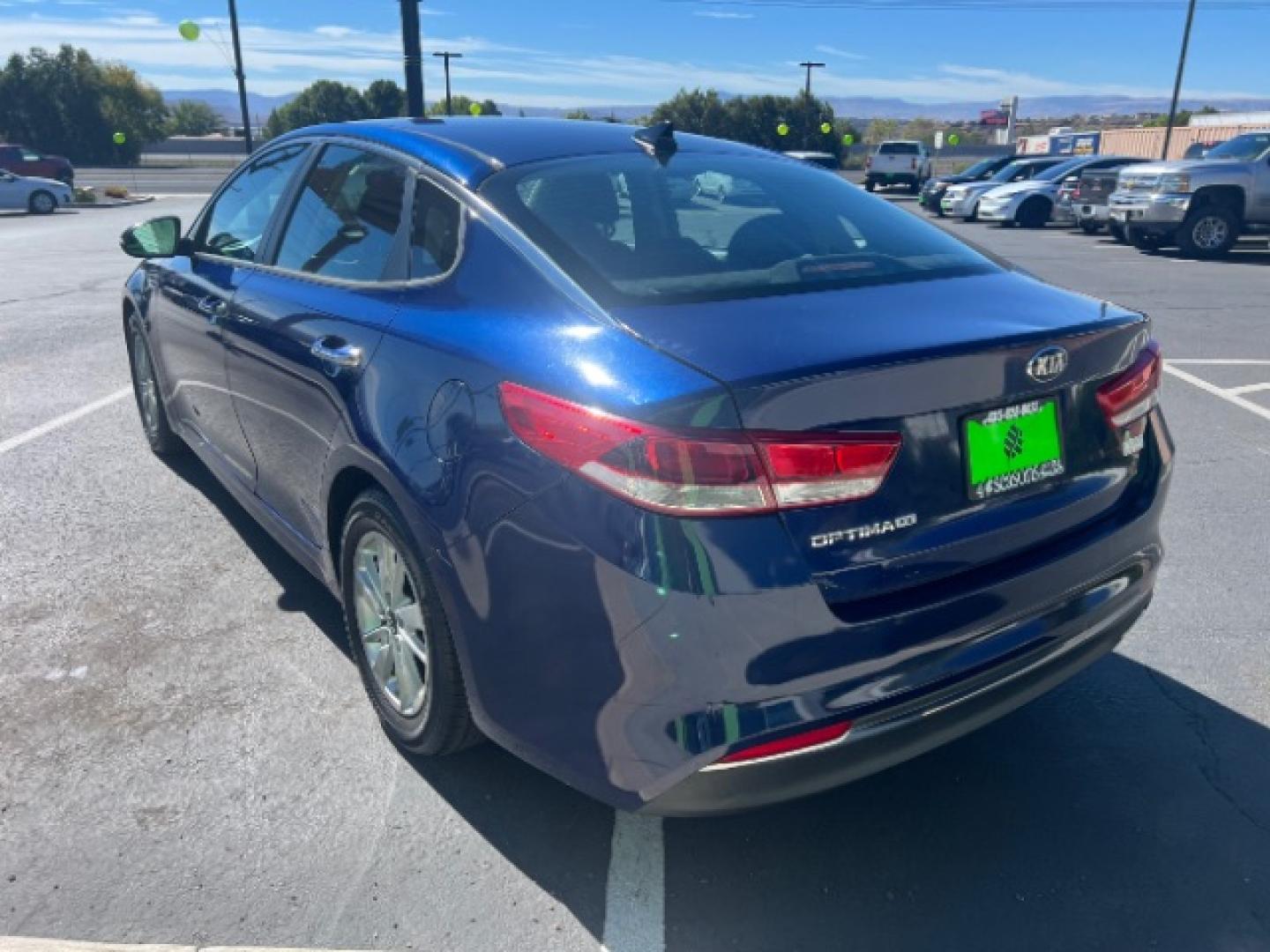 2017 Horizon Blue /Black Kia Optima LX (5XXGT4L36HG) with an Theta II 2.4L I-4 direct injection engine, Automatic transmission, located at 1865 East Red Hills Pkwy, St. George, 84770, (435) 628-0023, 37.120850, -113.543640 - Want a comfortable sedan that won't punish you at the pump? This 2017 Kia Optima LX brings Kia's 2.4L four-cylinder and front-wheel drive - a smooth daily driver for Southern Utah commuting and weekend trips. We specialize in in-house financing and work with all credit types - good, fair, challenge- Photo#4