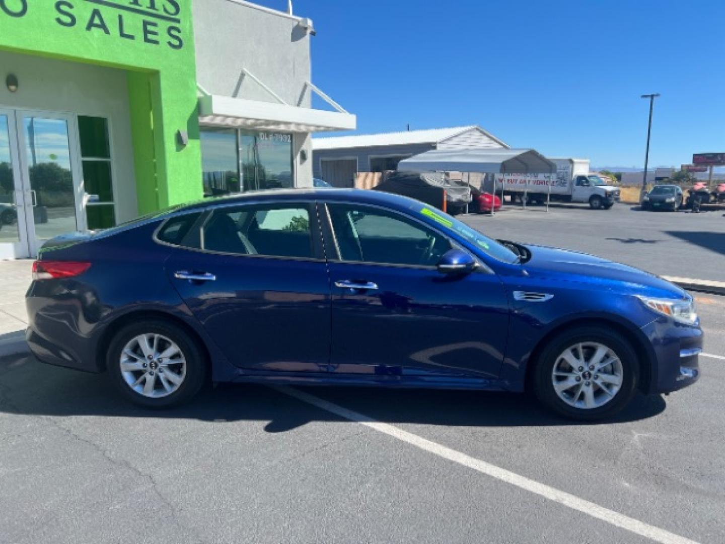 2017 Horizon Blue /Black Kia Optima LX (5XXGT4L36HG) with an Theta II 2.4L I-4 direct injection engine, Automatic transmission, located at 1865 East Red Hills Pkwy, St. George, 84770, (435) 628-0023, 37.120850, -113.543640 - Want a comfortable sedan that won't punish you at the pump? This 2017 Kia Optima LX brings Kia's 2.4L four-cylinder and front-wheel drive - a smooth daily driver for Southern Utah commuting and weekend trips. We specialize in in-house financing and work with all credit types - good, fair, challenge- Photo#7