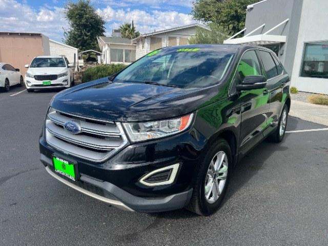 2016 Shadow Black /Ebony Ford Edge SEL (2FMPK3J84GB) with an 3.5L V-6 DOHC engine, Automatic transmission, located at 940 North Main Street, Cedar City, UT, 84720, (435) 628-0023, 37.692936, -113.061897 - Versatile Southern Utah travel starts with this 2016 Ford Edge SEL. Its 3.5L V6 engine, automatic transmission, and front-wheel drive make it a smart fit for commuting, family trips, and everyday errands. With 118215 miles, this Edge is ready for its next adventure. The SEL adds leather seating, he- Photo#2
