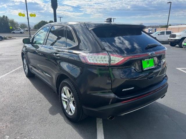 2016 Shadow Black /Ebony Ford Edge SEL (2FMPK3J84GB) with an 3.5L V-6 DOHC engine, Automatic transmission, located at 940 North Main Street, Cedar City, UT, 84720, (435) 628-0023, 37.692936, -113.061897 - Versatile Southern Utah travel starts with this 2016 Ford Edge SEL. Its 3.5L V6 engine, automatic transmission, and front-wheel drive make it a smart fit for commuting, family trips, and everyday errands. With 118215 miles, this Edge is ready for its next adventure. The SEL adds leather seating, he- Photo#4