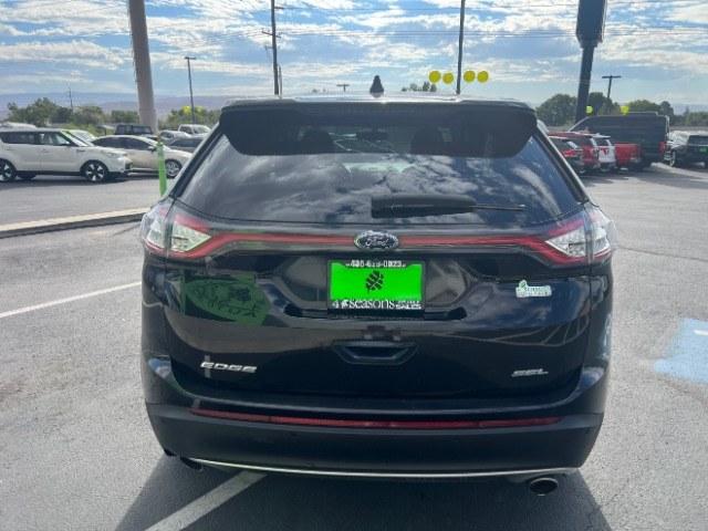 2016 Shadow Black /Ebony Ford Edge SEL (2FMPK3J84GB) with an 3.5L V-6 DOHC engine, Automatic transmission, located at 940 North Main Street, Cedar City, UT, 84720, (435) 628-0023, 37.692936, -113.061897 - Versatile Southern Utah travel starts with this 2016 Ford Edge SEL. Its 3.5L V6 engine, automatic transmission, and front-wheel drive make it a smart fit for commuting, family trips, and everyday errands. With 118215 miles, this Edge is ready for its next adventure. The SEL adds leather seating, he- Photo#5