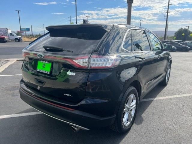 2016 Shadow Black /Ebony Ford Edge SEL (2FMPK3J84GB) with an 3.5L V-6 DOHC engine, Automatic transmission, located at 940 North Main Street, Cedar City, UT, 84720, (435) 628-0023, 37.692936, -113.061897 - Versatile Southern Utah travel starts with this 2016 Ford Edge SEL. Its 3.5L V6 engine, automatic transmission, and front-wheel drive make it a smart fit for commuting, family trips, and everyday errands. With 118215 miles, this Edge is ready for its next adventure. The SEL adds leather seating, he- Photo#6