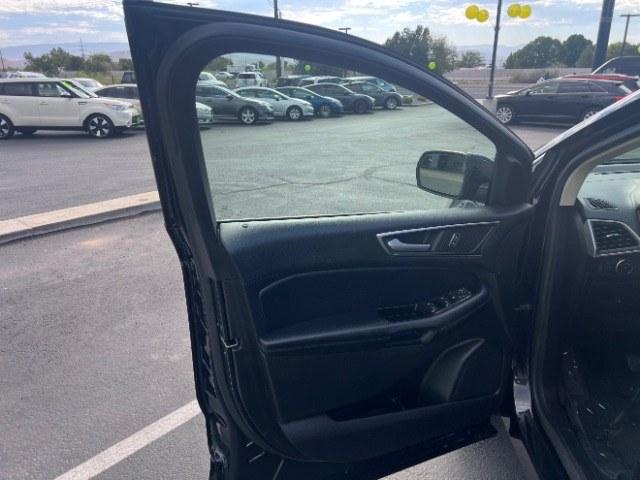 2016 Shadow Black /Ebony Ford Edge SEL (2FMPK3J84GB) with an 3.5L V-6 DOHC engine, Automatic transmission, located at 940 North Main Street, Cedar City, UT, 84720, (435) 628-0023, 37.692936, -113.061897 - Versatile Southern Utah travel starts with this 2016 Ford Edge SEL. Its 3.5L V6 engine, automatic transmission, and front-wheel drive make it a smart fit for commuting, family trips, and everyday errands. With 118215 miles, this Edge is ready for its next adventure. The SEL adds leather seating, he- Photo#12