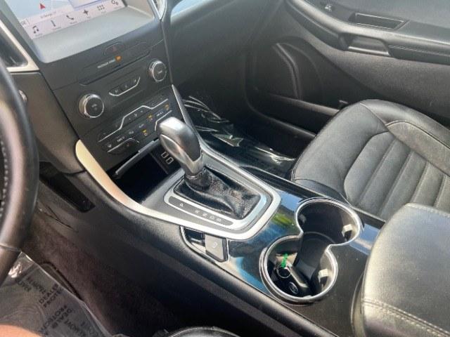 2016 Shadow Black /Ebony Ford Edge SEL (2FMPK3J84GB) with an 3.5L V-6 DOHC engine, Automatic transmission, located at 940 North Main Street, Cedar City, UT, 84720, (435) 628-0023, 37.692936, -113.061897 - Versatile Southern Utah travel starts with this 2016 Ford Edge SEL. Its 3.5L V6 engine, automatic transmission, and front-wheel drive make it a smart fit for commuting, family trips, and everyday errands. With 118215 miles, this Edge is ready for its next adventure. The SEL adds leather seating, he- Photo#15