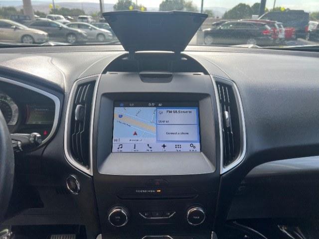 2016 Shadow Black /Ebony Ford Edge SEL (2FMPK3J84GB) with an 3.5L V-6 DOHC engine, Automatic transmission, located at 940 North Main Street, Cedar City, UT, 84720, (435) 628-0023, 37.692936, -113.061897 - Versatile Southern Utah travel starts with this 2016 Ford Edge SEL. Its 3.5L V6 engine, automatic transmission, and front-wheel drive make it a smart fit for commuting, family trips, and everyday errands. With 118215 miles, this Edge is ready for its next adventure. The SEL adds leather seating, he- Photo#18