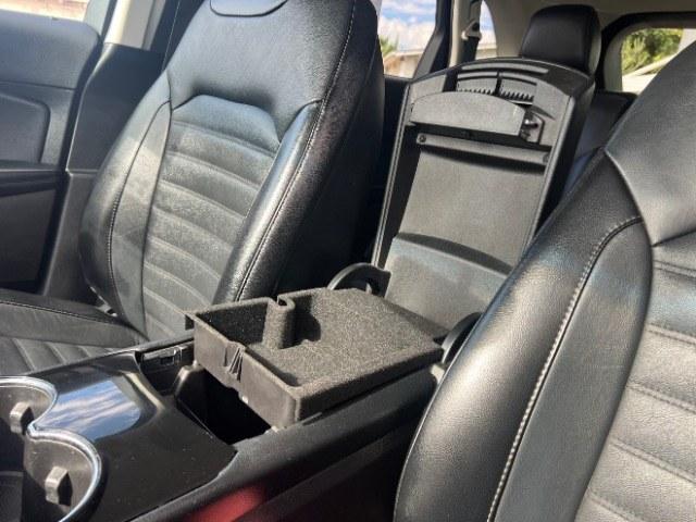 2016 Shadow Black /Ebony Ford Edge SEL (2FMPK3J84GB) with an 3.5L V-6 DOHC engine, Automatic transmission, located at 940 North Main Street, Cedar City, UT, 84720, (435) 628-0023, 37.692936, -113.061897 - Versatile Southern Utah travel starts with this 2016 Ford Edge SEL. Its 3.5L V6 engine, automatic transmission, and front-wheel drive make it a smart fit for commuting, family trips, and everyday errands. With 118215 miles, this Edge is ready for its next adventure. The SEL adds leather seating, he- Photo#19