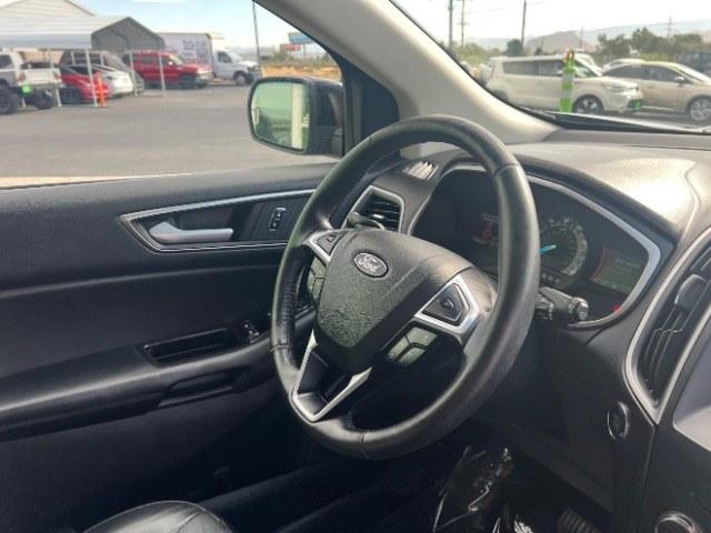 2016 Shadow Black /Ebony Ford Edge SEL (2FMPK3J84GB) with an 3.5L V-6 DOHC engine, Automatic transmission, located at 940 North Main Street, Cedar City, UT, 84720, (435) 628-0023, 37.692936, -113.061897 - Versatile Southern Utah travel starts with this 2016 Ford Edge SEL. Its 3.5L V6 engine, automatic transmission, and front-wheel drive make it a smart fit for commuting, family trips, and everyday errands. With 118215 miles, this Edge is ready for its next adventure. The SEL adds leather seating, he- Photo#30