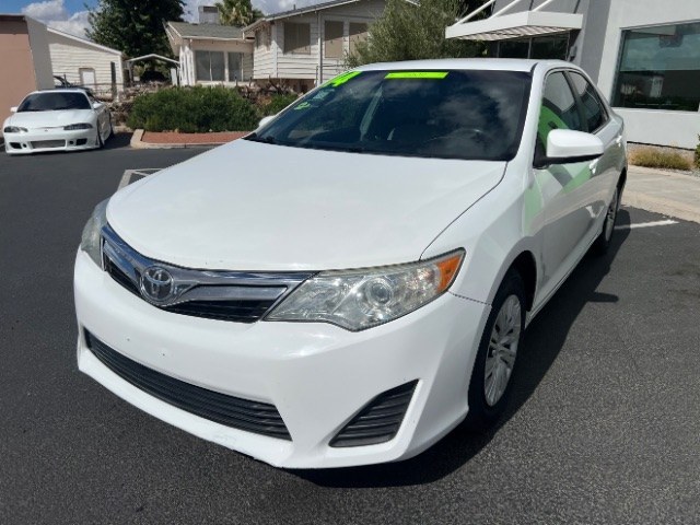 2014 Super White /Ivory Toyota Camry L | LE | XLE | SE | SE Sport (4T4BF1FK0ER) with an 2.5L I-4 DOHC engine, Automatic transmission, located at 1865 East Red Hills Pkwy, St. George, 84770, (435) 628-0023, 37.120850, -113.543640 - Versatile Southern Utah travel starts with this 2014 Toyota Camry. Its 2.5L 4-cylinder engine, automatic transmission, and front-wheel drive make it a smart fit for commuting, family errands, road trips, and everyday driving. With 102,927 miles, this Camry is ready for its next adventure. The selec- Photo#2