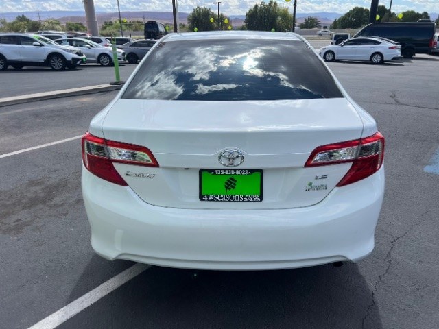 2014 Super White /Ivory Toyota Camry L | LE | XLE | SE | SE Sport (4T4BF1FK0ER) with an 2.5L I-4 DOHC engine, Automatic transmission, located at 1865 East Red Hills Pkwy, St. George, 84770, (435) 628-0023, 37.120850, -113.543640 - Versatile Southern Utah travel starts with this 2014 Toyota Camry. Its 2.5L 4-cylinder engine, automatic transmission, and front-wheel drive make it a smart fit for commuting, family errands, road trips, and everyday driving. With 102,927 miles, this Camry is ready for its next adventure. The selec- Photo#5