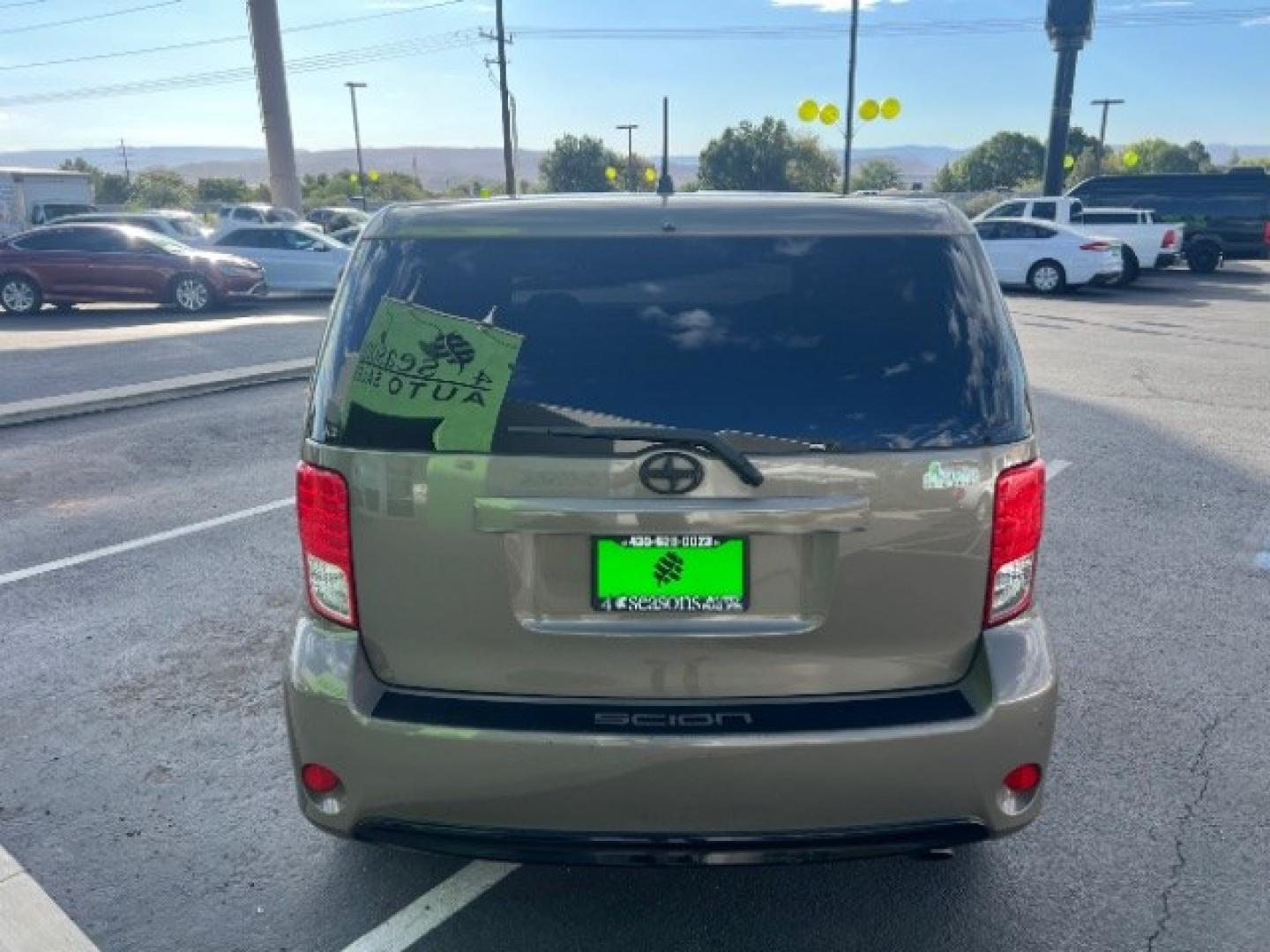2014 Army Rock Metallic /Dark Charcoal Scion xB Release Series (JTLZE4FE0EJ) with an 2.4L I-4 DOHC engine, Automatic transmission, located at 940 North Main Street, Cedar City, UT, 84720, (435) 628-0023, 37.692936, -113.061897- Photo#5
