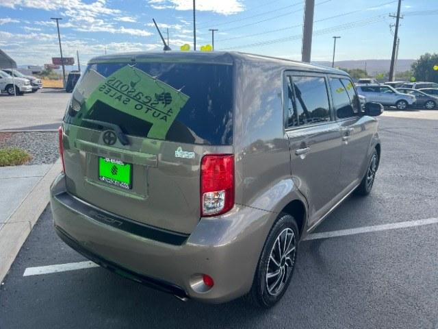 2014 Army Rock Metallic /Dark Charcoal Scion xB Release Series (JTLZE4FE0EJ) with an 2.4L I-4 DOHC engine, Automatic transmission, located at 940 North Main Street, Cedar City, UT, 84720, (435) 628-0023, 37.692936, -113.061897 - Versatile Southern Utah travel starts with this 2014 Scion xB Release Series. Its 2.4L 4-cylinder, automatic transmission, and front-wheel drive make it a smart fit for commuting, campus runs, errands, and weekend trips. With 166,283 miles, this xB is ready for its next adventure. The Release Serie- Photo#6