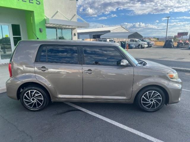 2014 Army Rock Metallic /Dark Charcoal Scion xB Release Series (JTLZE4FE0EJ) with an 2.4L I-4 DOHC engine, Automatic transmission, located at 940 North Main Street, Cedar City, UT, 84720, (435) 628-0023, 37.692936, -113.061897 - Versatile Southern Utah travel starts with this 2014 Scion xB Release Series. Its 2.4L 4-cylinder, automatic transmission, and front-wheel drive make it a smart fit for commuting, campus runs, errands, and weekend trips. With 166,283 miles, this xB is ready for its next adventure. The Release Serie- Photo#7