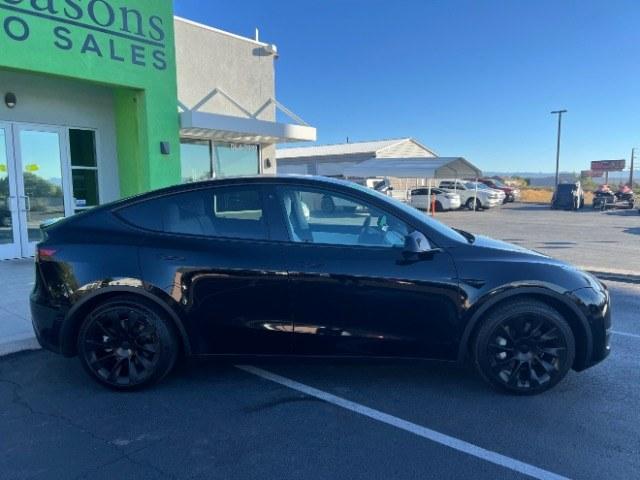 2022 Solid Black /White/Black Tesla Model Y Long Range Dual Motor All-Wheel Drive (7SAYGAEE6NF) with an ELECTRIC engine, Electric transmission, located at 1865 East Red Hills Pkwy, St. George, 84770, (435) 628-0023, 37.120850, -113.543640 - Tesla Model Y All Wheel Drive HW3 with 7 Seats, Third Row, Great tires, Interior is in great condition. Dont let the miles scare you this Tesla has been thoroughly inspected and has plenty of life. Every Tesla we sell has had cabin air filter replaced, radiator cleaned, fluids topped AND comes w- Photo#9