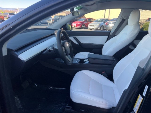 2022 Solid Black /White/Black Tesla Model Y Long Range Dual Motor All-Wheel Drive (7SAYGAEE6NF) with an ELECTRIC engine, Electric transmission, located at 1865 East Red Hills Pkwy, St. George, 84770, (435) 628-0023, 37.120850, -113.543640 - Tesla Model Y All Wheel Drive HW3 with 7 Seats, Third Row, Great tires, Interior is in great condition. Dont let the miles scare you this Tesla has been thoroughly inspected and has plenty of life. Every Tesla we sell has had cabin air filter replaced, radiator cleaned, fluids topped AND comes w- Photo#16