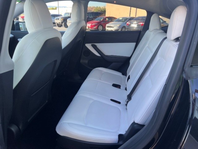 2022 Solid Black /White/Black Tesla Model Y Long Range Dual Motor All-Wheel Drive (7SAYGAEE6NF) with an ELECTRIC engine, Electric transmission, located at 1865 East Red Hills Pkwy, St. George, 84770, (435) 628-0023, 37.120850, -113.543640 - Tesla Model Y All Wheel Drive HW3 with 7 Seats, Third Row, Great tires, Interior is in great condition. Dont let the miles scare you this Tesla has been thoroughly inspected and has plenty of life. Every Tesla we sell has had cabin air filter replaced, radiator cleaned, fluids topped AND comes w- Photo#21