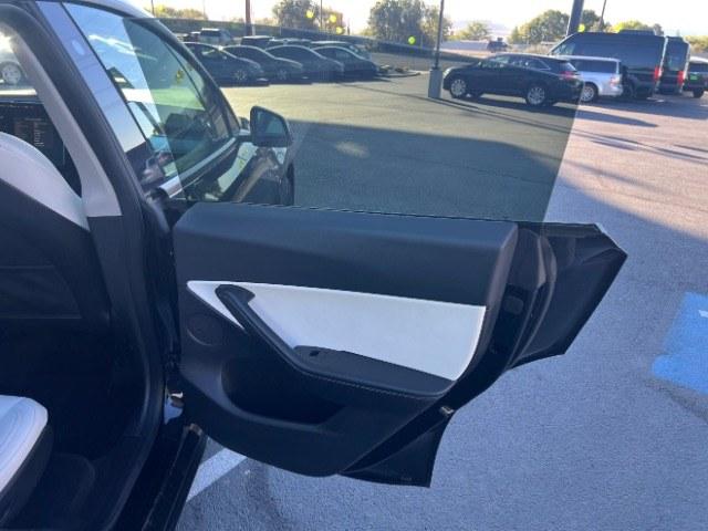2022 Solid Black /White/Black Tesla Model Y Long Range Dual Motor All-Wheel Drive (7SAYGAEE6NF) with an ELECTRIC engine, Electric transmission, located at 1865 East Red Hills Pkwy, St. George, 84770, (435) 628-0023, 37.120850, -113.543640 - Tesla Model Y All Wheel Drive HW3 with 7 Seats, Third Row, Great tires, Interior is in great condition. Dont let the miles scare you this Tesla has been thoroughly inspected and has plenty of life. Every Tesla we sell has had cabin air filter replaced, radiator cleaned, fluids topped AND comes w- Photo#25
