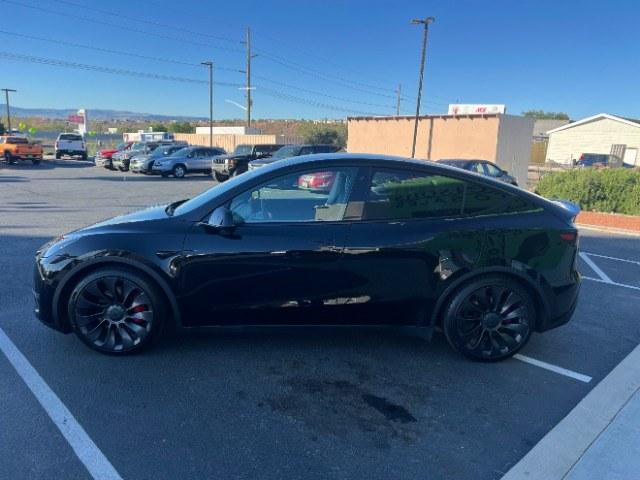 2022 Solid Black /Black Tesla Model Y Performance Dual Motor All-Wheel Drive (7SAYGDEF3NF) with an ELECTRIC engine, Electric transmission, located at 1865 East Red Hills Pkwy, St. George, 84770, (435) 628-0023, 37.120850, -113.543640 - Beautiful Tesla Model Y Performance with white interior. Excellent condition, new tires. Battery gets 260 miles on a full charge. Thats 82% healthy battery. 2 Owner, No accidents. At 4 Seasons Auto we clean the radiator and replace the cabin air filter on every Tesla. We also provide a CHARGER K- Photo#5