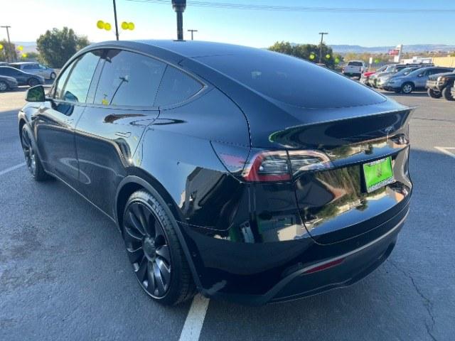 2022 Solid Black /Black Tesla Model Y Performance Dual Motor All-Wheel Drive (7SAYGDEF3NF) with an ELECTRIC engine, Electric transmission, located at 1865 East Red Hills Pkwy, St. George, 84770, (435) 628-0023, 37.120850, -113.543640 - Beautiful Tesla Model Y Performance with white interior. Excellent condition, new tires. Battery gets 260 miles on a full charge. Thats 82% healthy battery. 2 Owner, No accidents. At 4 Seasons Auto we clean the radiator and replace the cabin air filter on every Tesla. We also provide a CHARGER K- Photo#6