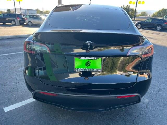 2022 Solid Black /Black Tesla Model Y Performance Dual Motor All-Wheel Drive (7SAYGDEF3NF) with an ELECTRIC engine, Electric transmission, located at 1865 East Red Hills Pkwy, St. George, 84770, (435) 628-0023, 37.120850, -113.543640 - Beautiful Tesla Model Y Performance with white interior. Excellent condition, new tires. Battery gets 260 miles on a full charge. Thats 82% healthy battery. 2 Owner, No accidents. At 4 Seasons Auto we clean the radiator and replace the cabin air filter on every Tesla. We also provide a CHARGER K- Photo#7