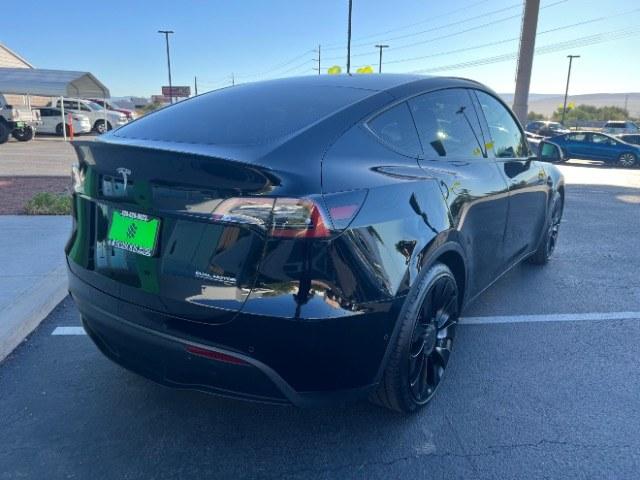 2022 Solid Black /Black Tesla Model Y Performance Dual Motor All-Wheel Drive (7SAYGDEF3NF) with an ELECTRIC engine, Electric transmission, located at 1865 East Red Hills Pkwy, St. George, 84770, (435) 628-0023, 37.120850, -113.543640 - Beautiful Tesla Model Y Performance with white interior. Excellent condition, new tires. Battery gets 260 miles on a full charge. Thats 82% healthy battery. 2 Owner, No accidents. At 4 Seasons Auto we clean the radiator and replace the cabin air filter on every Tesla. We also provide a CHARGER K- Photo#8