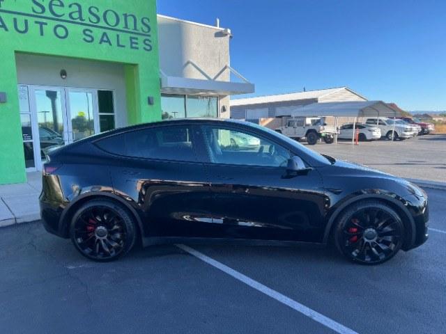 2022 Solid Black /Black Tesla Model Y Performance Dual Motor All-Wheel Drive (7SAYGDEF3NF) with an ELECTRIC engine, Electric transmission, located at 1865 East Red Hills Pkwy, St. George, 84770, (435) 628-0023, 37.120850, -113.543640 - Beautiful Tesla Model Y Performance with white interior. Excellent condition, new tires. Battery gets 260 miles on a full charge. Thats 82% healthy battery. 2 Owner, No accidents. At 4 Seasons Auto we clean the radiator and replace the cabin air filter on every Tesla. We also provide a CHARGER K- Photo#9