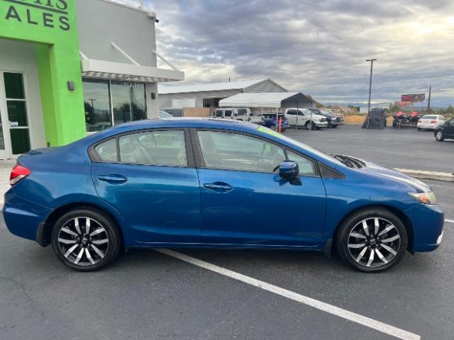 2015 Dyno Blue Pearl /Beige Honda Civic EX-L (2HGFB2F95FH) with an 1.8L I-4 i-VTEC variable valve control engine, Automatic transmission, located at 940 North Main Street, Cedar City, UT, 84720, (435) 628-0023, 37.692936, -113.061897 - Versatile Southern Utah travel starts with this 2015 Honda Civic EX-L. Its 1.8L 4-cylinder, continuously variable transmission, and front-wheel drive make it a smart fit for commuting, errands, and comfortable daily driving. With 147556 miles, this Civic is ready for its next adventure. The EX-L ad- Photo#7