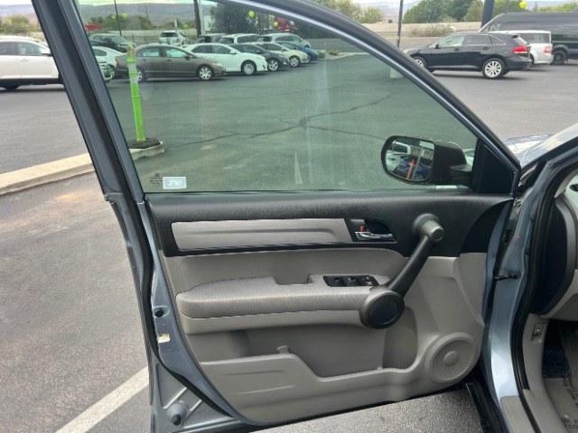2011 Glacier Blue Metallic /Gray Honda CR-V EX (5J6RE3H52BL) with an 2.4L I-4 DOHC engine, Automatic transmission, located at 940 North Main Street, Cedar City, UT, 84720, (435) 628-0023, 37.692936, -113.061897 - Versatile Southern Utah travel starts with this 2011 Honda CR-V EX. Its 2.4L 4-cylinder, 5-speed automatic transmission, and front-wheel drive make it a smart fit for commuting, errands, and weekend travel. With 104217 miles, this CR-V is ready for its next adventure. The EX adds a power moonroof,- Photo#12
