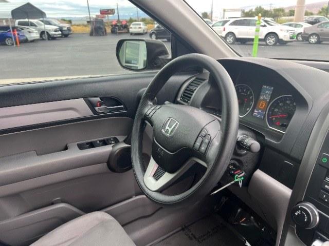 2011 Glacier Blue Metallic /Gray Honda CR-V EX (5J6RE3H52BL) with an 2.4L I-4 DOHC engine, Automatic transmission, located at 940 North Main Street, Cedar City, UT, 84720, (435) 628-0023, 37.692936, -113.061897 - Versatile Southern Utah travel starts with this 2011 Honda CR-V EX. Its 2.4L 4-cylinder, 5-speed automatic transmission, and front-wheel drive make it a smart fit for commuting, errands, and weekend travel. With 104217 miles, this CR-V is ready for its next adventure. The EX adds a power moonroof,- Photo#29