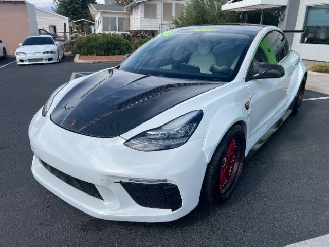 2020 Pearl White Multi-Coat /White/Black Tesla Model 3 Long Range Dual Motor All-Wheel Drive (5YJ3E1EB7LF) with an Electric engine, Electric transmission, located at 1865 East Red Hills Pkwy, St. George, 84770, (435) 628-0023, 37.120850, -113.543640 - Insanely customized Tesla Model 3. One of a kind that is sure to make people notice you! Despite all these custom parts this tesla still operates perfectly. Rides smooth and all Tesla technology works like it should. What makes this M3 so special: Lambo doors, custom hood, rear spoiler, wheels and- Photo#5