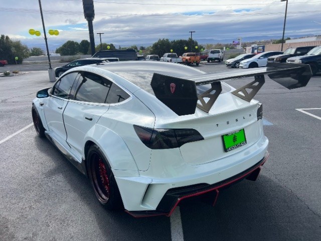 2020 Pearl White Multi-Coat /White/Black Tesla Model 3 Long Range Dual Motor All-Wheel Drive (5YJ3E1EB7LF) with an Electric engine, Electric transmission, located at 1865 East Red Hills Pkwy, St. George, 84770, (435) 628-0023, 37.120850, -113.543640 - Insanely customized Tesla Model 3. One of a kind that is sure to make people notice you! Despite all these custom parts this tesla still operates perfectly. Rides smooth and all Tesla technology works like it should. What makes this M3 so special: Lambo doors, custom hood, rear spoiler, wheels and- Photo#7