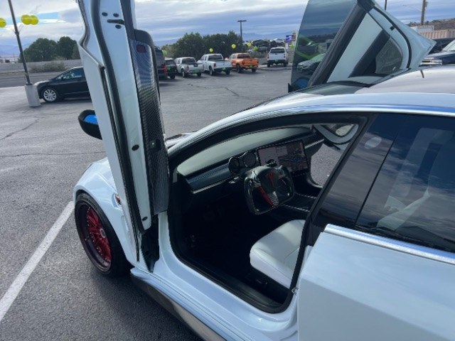 2020 Pearl White Multi-Coat /White/Black Tesla Model 3 Long Range Dual Motor All-Wheel Drive (5YJ3E1EB7LF) with an Electric engine, Electric transmission, located at 1865 East Red Hills Pkwy, St. George, 84770, (435) 628-0023, 37.120850, -113.543640 - Insanely customized Tesla Model 3. One of a kind that is sure to make people notice you! Despite all these custom parts this tesla still operates perfectly. Rides smooth and all Tesla technology works like it should. What makes this M3 so special: Lambo doors, custom hood, rear spoiler, wheels and- Photo#8
