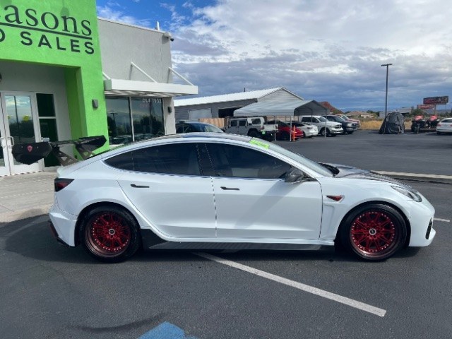 2020 Pearl White Multi-Coat /White/Black Tesla Model 3 Long Range Dual Motor All-Wheel Drive (5YJ3E1EB7LF) with an Electric engine, Electric transmission, located at 1865 East Red Hills Pkwy, St. George, 84770, (435) 628-0023, 37.120850, -113.543640 - Insanely customized Tesla Model 3. One of a kind that is sure to make people notice you! Despite all these custom parts this tesla still operates perfectly. Rides smooth and all Tesla technology works like it should. What makes this M3 so special: Lambo doors, custom hood, rear spoiler, wheels and- Photo#13