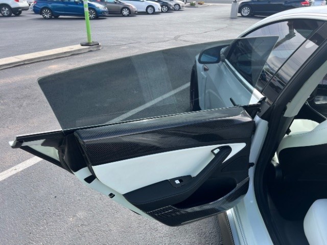 2020 Pearl White Multi-Coat /White/Black Tesla Model 3 Long Range Dual Motor All-Wheel Drive (5YJ3E1EB7LF) with an Electric engine, Electric transmission, located at 1865 East Red Hills Pkwy, St. George, 84770, (435) 628-0023, 37.120850, -113.543640 - Insanely customized Tesla Model 3. One of a kind that is sure to make people notice you! Despite all these custom parts this tesla still operates perfectly. Rides smooth and all Tesla technology works like it should. What makes this M3 so special: Lambo doors, custom hood, rear spoiler, wheels and- Photo#23