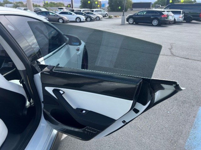 2020 Pearl White Multi-Coat /White/Black Tesla Model 3 Long Range Dual Motor All-Wheel Drive (5YJ3E1EB7LF) with an Electric engine, Electric transmission, located at 1865 East Red Hills Pkwy, St. George, 84770, (435) 628-0023, 37.120850, -113.543640 - Insanely customized Tesla Model 3. One of a kind that is sure to make people notice you! Despite all these custom parts this tesla still operates perfectly. Rides smooth and all Tesla technology works like it should. What makes this M3 so special: Lambo doors, custom hood, rear spoiler, wheels and- Photo#29