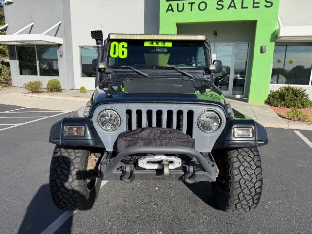 2006 Black Clearcoat/Dark Khaki Soft Top /Dark Slate Gray Jeep Wrangler Unlimited LJ (1J4FA44SX6P) with an Power Tech 4L I-6 regular gasoline engine, Automatic transmission, located at 1865 East Red Hills Pkwy, St. George, 84770, (435) 628-0023, 37.120850, -113.543640 - Versatile Southern Utah travel starts with this 2006 Jeep Wrangler Unlimited LJ LONG WHEEL BASE. Its 4.0L inline 6-cylinder, 4-speed automatic, and 4x4 make it a smart fit for trail exploring, camping trips, and outdoor weekends. With 117,500 miles, this Wrangler is ready for its next adventure. Th- Photo#1