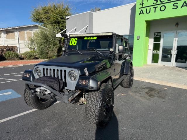 2006 Black Clearcoat/Dark Khaki Soft Top /Dark Slate Gray Jeep Wrangler Unlimited LJ (1J4FA44SX6P) with an Power Tech 4L I-6 regular gasoline engine, Automatic transmission, located at 1865 East Red Hills Pkwy, St. George, 84770, (435) 628-0023, 37.120850, -113.543640 - Versatile Southern Utah travel starts with this 2006 Jeep Wrangler Unlimited LJ LONG WHEEL BASE. Its 4.0L inline 6-cylinder, 4-speed automatic, and 4x4 make it a smart fit for trail exploring, camping trips, and outdoor weekends. With 117,500 miles, this Wrangler is ready for its next adventure. Th- Photo#2