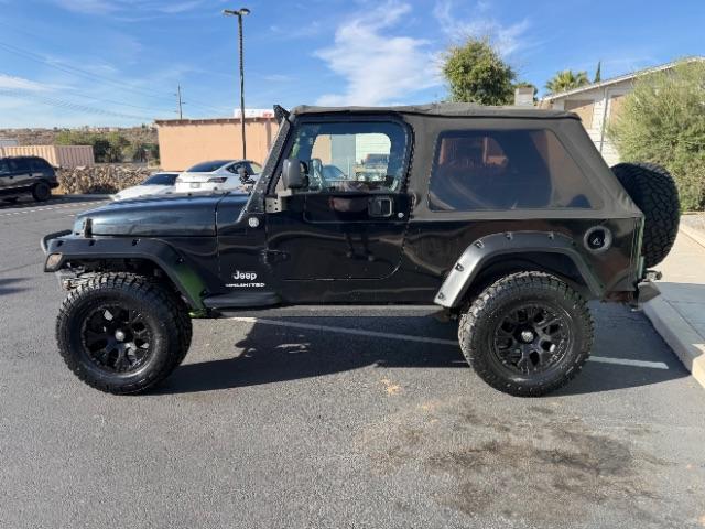 2006 Black Clearcoat/Dark Khaki Soft Top /Dark Slate Gray Jeep Wrangler Unlimited LJ (1J4FA44SX6P) with an Power Tech 4L I-6 regular gasoline engine, Automatic transmission, located at 1865 East Red Hills Pkwy, St. George, 84770, (435) 628-0023, 37.120850, -113.543640 - Versatile Southern Utah travel starts with this 2006 Jeep Wrangler Unlimited LJ LONG WHEEL BASE. Its 4.0L inline 6-cylinder, 4-speed automatic, and 4x4 make it a smart fit for trail exploring, camping trips, and outdoor weekends. With 117,500 miles, this Wrangler is ready for its next adventure. Th- Photo#3
