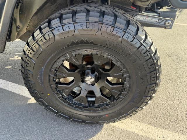 2006 Black Clearcoat/Dark Khaki Soft Top /Dark Slate Gray Jeep Wrangler Unlimited LJ (1J4FA44SX6P) with an Power Tech 4L I-6 regular gasoline engine, Automatic transmission, located at 1865 East Red Hills Pkwy, St. George, 84770, (435) 628-0023, 37.120850, -113.543640 - Versatile Southern Utah travel starts with this 2006 Jeep Wrangler Unlimited LJ LONG WHEEL BASE. Its 4.0L inline 6-cylinder, 4-speed automatic, and 4x4 make it a smart fit for trail exploring, camping trips, and outdoor weekends. With 117,500 miles, this Wrangler is ready for its next adventure. Th- Photo#5