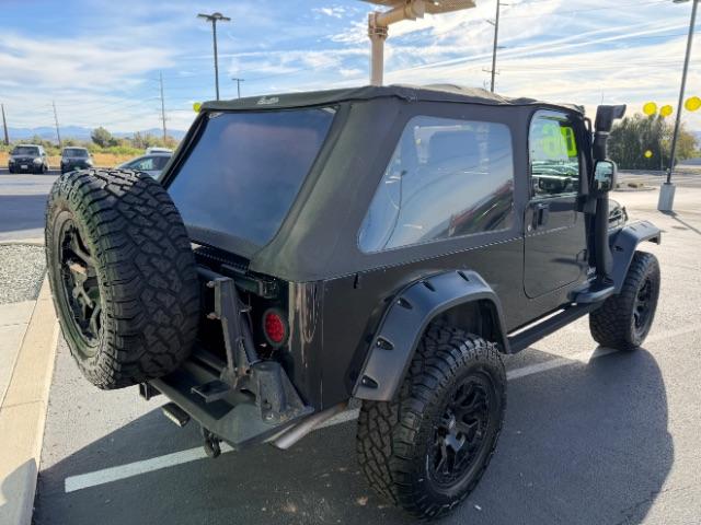 2006 Black Clearcoat/Dark Khaki Soft Top /Dark Slate Gray Jeep Wrangler Unlimited LJ (1J4FA44SX6P) with an Power Tech 4L I-6 regular gasoline engine, Automatic transmission, located at 1865 East Red Hills Pkwy, St. George, 84770, (435) 628-0023, 37.120850, -113.543640 - Versatile Southern Utah travel starts with this 2006 Jeep Wrangler Unlimited LJ LONG WHEEL BASE. Its 4.0L inline 6-cylinder, 4-speed automatic, and 4x4 make it a smart fit for trail exploring, camping trips, and outdoor weekends. With 117,500 miles, this Wrangler is ready for its next adventure. Th- Photo#7