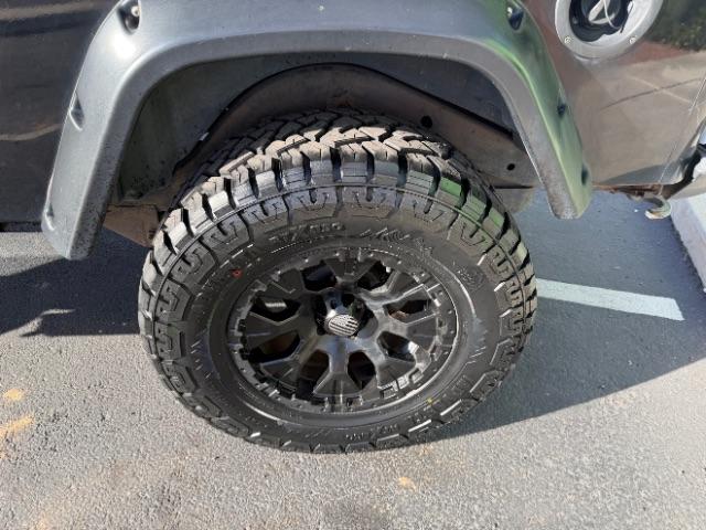 2006 Black Clearcoat/Dark Khaki Soft Top /Dark Slate Gray Jeep Wrangler Unlimited LJ (1J4FA44SX6P) with an Power Tech 4L I-6 regular gasoline engine, Automatic transmission, located at 1865 East Red Hills Pkwy, St. George, 84770, (435) 628-0023, 37.120850, -113.543640 - Versatile Southern Utah travel starts with this 2006 Jeep Wrangler Unlimited LJ LONG WHEEL BASE. Its 4.0L inline 6-cylinder, 4-speed automatic, and 4x4 make it a smart fit for trail exploring, camping trips, and outdoor weekends. With 117,500 miles, this Wrangler is ready for its next adventure. Th- Photo#8