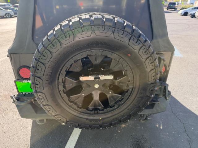 2006 Black Clearcoat/Dark Khaki Soft Top /Dark Slate Gray Jeep Wrangler Unlimited LJ (1J4FA44SX6P) with an Power Tech 4L I-6 regular gasoline engine, Automatic transmission, located at 1865 East Red Hills Pkwy, St. George, 84770, (435) 628-0023, 37.120850, -113.543640 - Versatile Southern Utah travel starts with this 2006 Jeep Wrangler Unlimited LJ LONG WHEEL BASE. Its 4.0L inline 6-cylinder, 4-speed automatic, and 4x4 make it a smart fit for trail exploring, camping trips, and outdoor weekends. With 117,500 miles, this Wrangler is ready for its next adventure. Th- Photo#9