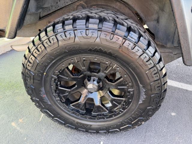 2006 Black Clearcoat/Dark Khaki Soft Top /Dark Slate Gray Jeep Wrangler Unlimited LJ (1J4FA44SX6P) with an Power Tech 4L I-6 regular gasoline engine, Automatic transmission, located at 1865 East Red Hills Pkwy, St. George, 84770, (435) 628-0023, 37.120850, -113.543640 - Versatile Southern Utah travel starts with this 2006 Jeep Wrangler Unlimited LJ LONG WHEEL BASE. Its 4.0L inline 6-cylinder, 4-speed automatic, and 4x4 make it a smart fit for trail exploring, camping trips, and outdoor weekends. With 117,500 miles, this Wrangler is ready for its next adventure. Th- Photo#10
