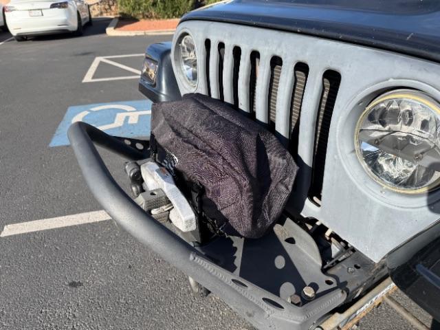 2006 Black Clearcoat/Dark Khaki Soft Top /Dark Slate Gray Jeep Wrangler Unlimited LJ (1J4FA44SX6P) with an Power Tech 4L I-6 regular gasoline engine, Automatic transmission, located at 1865 East Red Hills Pkwy, St. George, 84770, (435) 628-0023, 37.120850, -113.543640 - Versatile Southern Utah travel starts with this 2006 Jeep Wrangler Unlimited LJ LONG WHEEL BASE. Its 4.0L inline 6-cylinder, 4-speed automatic, and 4x4 make it a smart fit for trail exploring, camping trips, and outdoor weekends. With 117,500 miles, this Wrangler is ready for its next adventure. Th- Photo#12