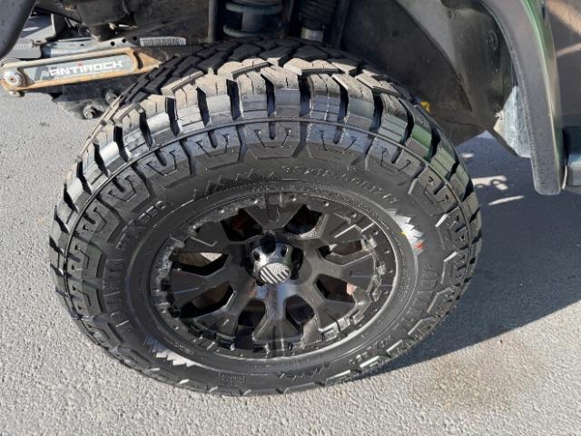 2006 Black Clearcoat/Dark Khaki Soft Top /Dark Slate Gray Jeep Wrangler Unlimited LJ (1J4FA44SX6P) with an Power Tech 4L I-6 regular gasoline engine, Automatic transmission, located at 1865 East Red Hills Pkwy, St. George, 84770, (435) 628-0023, 37.120850, -113.543640 - Versatile Southern Utah travel starts with this 2006 Jeep Wrangler Unlimited LJ LONG WHEEL BASE. Its 4.0L inline 6-cylinder, 4-speed automatic, and 4x4 make it a smart fit for trail exploring, camping trips, and outdoor weekends. With 117,500 miles, this Wrangler is ready for its next adventure. Th- Photo#13
